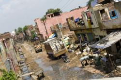 Cities can offer their citizens many social and economic benefits, but they can also become deep poverty traps, when not managed properly. Photo by Markus Schieder, Getty Images.